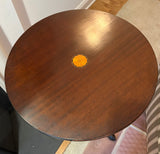 Tilt top pedestal table