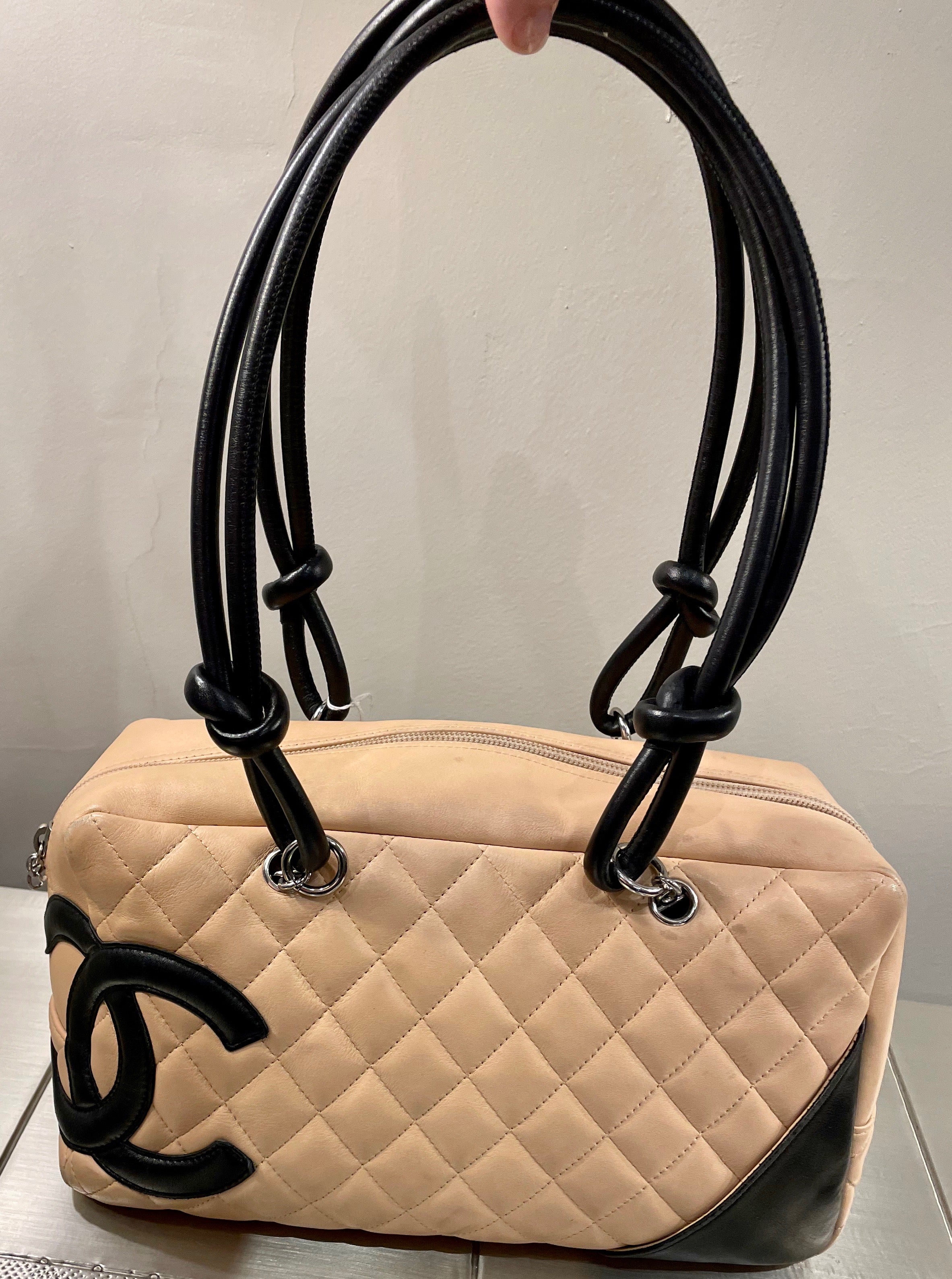 beige quilted chanel bag